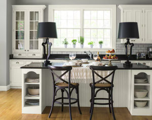 Modern white kitchen cabinets professionally refinished by Fresh Look Painting in Barrie, a popular fall interior painting project.